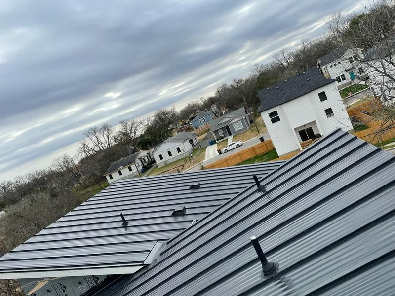 Standing seam metal roof panels with vents for Skylight Repair in Beaverton